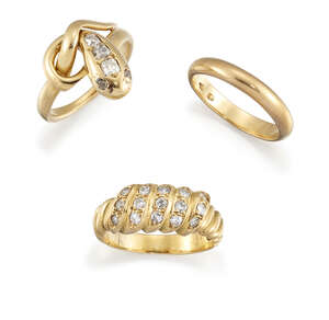 
	
		Three rings, comprising: one of serpent design, the old-cut diamond three stone head with...