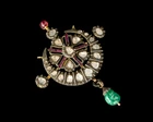 A diamond- and emerald-set Naya Chand Nyam pendant,India, circa 1900-1920
Made of five...