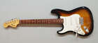 
	
		A left-handed Squire Strat by Fender guitar, with 22 frets, volume and tone knobs,...