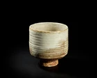 Mansimran Singh (Indian B. 1939),
High footed bowl with grooves and pale glaze, signed below...