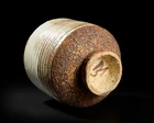 Mansimran Singh (Indian B. 1939),
High footed bowl with grooves and pale glaze, signed below...