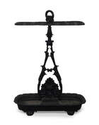 
	
		An early Victorian black-painted cast-iron stick stand, mid 19th century, after a design...