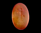 A Graeco-Egyptian carnelian intaglio of a Deity,Ptolemaic to Roman period, circa 1st century...