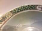 
	
		A Chinese porcelain boy and chicken bowl, 19th century, painted in famille verte enamels...