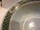 
	
		A Chinese porcelain boy and chicken bowl, 19th century, painted in famille verte enamels...