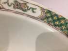 
	
		A Chinese porcelain boy and chicken bowl, 19th century, painted in famille verte enamels...