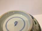 
	
		A Chinese porcelain boy and chicken bowl, 19th century, painted in famille verte enamels...
