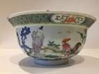 
	
		A Chinese porcelain boy and chicken bowl, 19th century, painted in famille verte enamels...