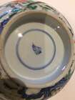 
	
		A Chinese porcelain boy and chicken bowl, 19th century, painted in famille verte enamels...