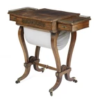 A Regency brass inlaid rosewood work table, first quarter 19th century, the stepped top flanked...