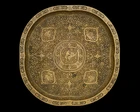 An engraved copper alloy lobed tray, Iran, 19th century or later, 
the central lobed medallion...