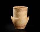 A sizeable Egyptian alabaster vase, New Kingdom, circa 1279-1213 B.C.
with vestigial handles...