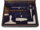 
	
		A Masonic working tools presentation box, early 20th century, to include: wood gavel,...