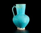 A globular turquoise blue glazed pottery jug, Ilkhanid central Iran, 12th/13th century, 
On...