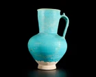 A globular turquoise blue glazed pottery jug, Ilkhanid central Iran, 12th/13th century, 
On...