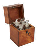 
	
		A satinwood cube-shape miniature decanter box, 19th century, containing four glass...