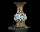 A hanging openwork copper alloy mounted pottery lamp, the body Kutahya, Ottoman Turkey, second...