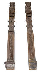 
	
		A pair of Continental carved figural oak pilasters, 19th century, with angel heads with...