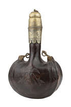 
	
		A rare large inscribed brass-mounted leather flask, North India, 19th century, of typical...