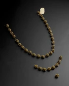 A gold mounted thirty five bezoar stones necklace, North India, 19th century, 
Each stone in...