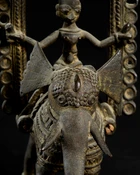A bronze figure of Indra on Airavata, Bastar, Eastern India, 19th century, 
Under a domed...