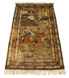 A pair of Persian Kashan silk pictorial rugs, late 19th/early 20th century, woven with nobleman...
