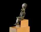 A small Egyptian bronze figure of a seated lion-headed Sekhmet,Late Period, circa 664-525...
