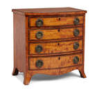 
	
		A Regency satinwood miniature bow-fronted chest, the four long drawers inlaid with ebony...