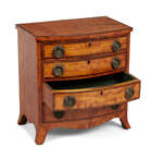 
	
		A Regency satinwood miniature bow-fronted chest, the four long drawers inlaid with ebony...