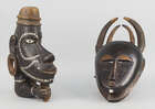 
	
		A Solomon Islands canoe prow figure head, in the form of a man, with elongated nose and...