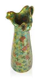 
	
		 Zsolnay (Hungarian), an Art Nouveau Eosin glazed three handled vase, the form designed...