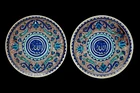 Two Kutahya pottery dishes, Turkey, 20th century, 
Each shallow, on short straight foot, the...