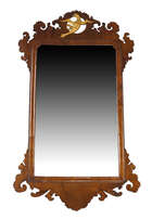 
	
		A George III mahogany fretwork mirror, late 18th century, the scrolling frame with...