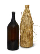 
	
		A French brown glass Jeroboam Champagne bottle, late 19th century, with a straw carriage...