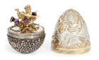 
	
		 A limited edition silver gilt surprise egg by Stuart Devlin, London, c.1986, opening to...