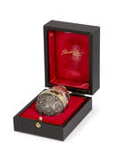 
	
		 A limited edition silver gilt surprise egg by Stuart Devlin, London, c.1986, opening to...