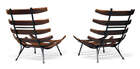 
	
		Attributed to Martin Eisler and Carlo Hauner, a pair of "Costela" lounge chairs,  
		