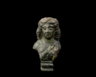 A Roman bronze stool support with the bust of a youth, Circa 2nd-3rd Century A.D.,
On a stepped...
