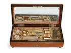 
	
		A French satinwood sarcophagus sewing necessaire, 19th century, the lid with gilt metal...
