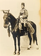 An equestrian and a standing portrait of cavalrymen, Egypt, 20th century, 
Possibly of men who...