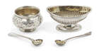 
	
		Two cased Victorian silver condiment sets, comprising a set of four rounded salt cellars,...