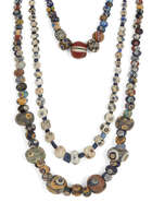 
	
		Two Eastern Mediterranean 'eye' bead necklaces
		Circa 5th-3rd Century B.C. and Later