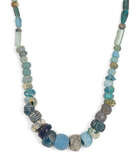 
	
		Seven strings of hardstone, glass, calcite and glazed faience beads
		Circa 1st...