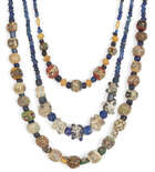 
	
		Two mostly Roman mosaic glass bead necklaces and an eye bead necklace
		1st Century...