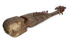 
	
		A Rubab, Afghanistan, early 20th century, the short-necked lute made of wood with goat...