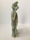 
	
		A Chinese jadeite figure of a woman and child, early 20th century, carved standing, each...
