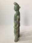 
	
		A Chinese jadeite figure of a woman and child, early 20th century, carved standing, each...