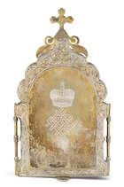 A Russian silver-gilt travelling triptych icon, by Ivan Khlebnikov, Moscow, 1899-1908, assay...