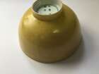 
	
		A Chinese porcelain incised yellow-glazed bowl, Kangxi mark and of the period, incised to...