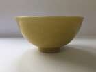 
	
		A Chinese porcelain incised yellow-glazed bowl, Kangxi mark and of the period, incised to...
